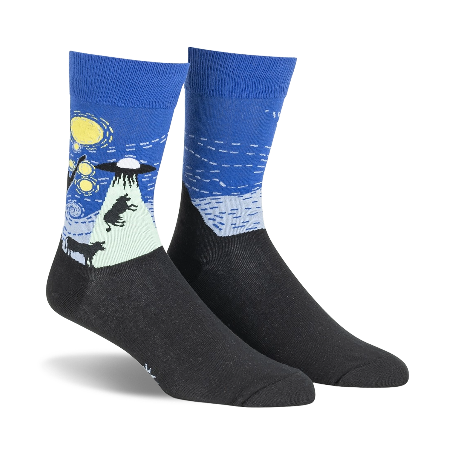 Pair of crew socks in navy blue and black, depicting a whimsical UFO scene against a starry night sky.