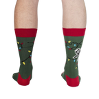 Back view of the 'Eating Light' socks on a model, showing the full design.