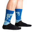 Lifestyle shot of a person wearing the Northern Lights socks, showcasing the design and fit.