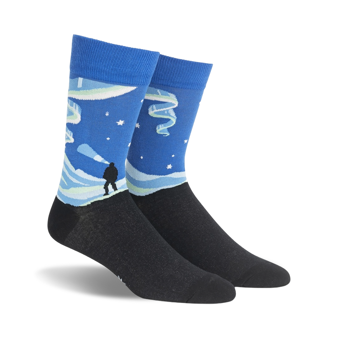 Crew socks showcasing a Northern Lights design. The socks are primarily blue with teal and white accents, depicting a snowy landscape and the aurora borealis.