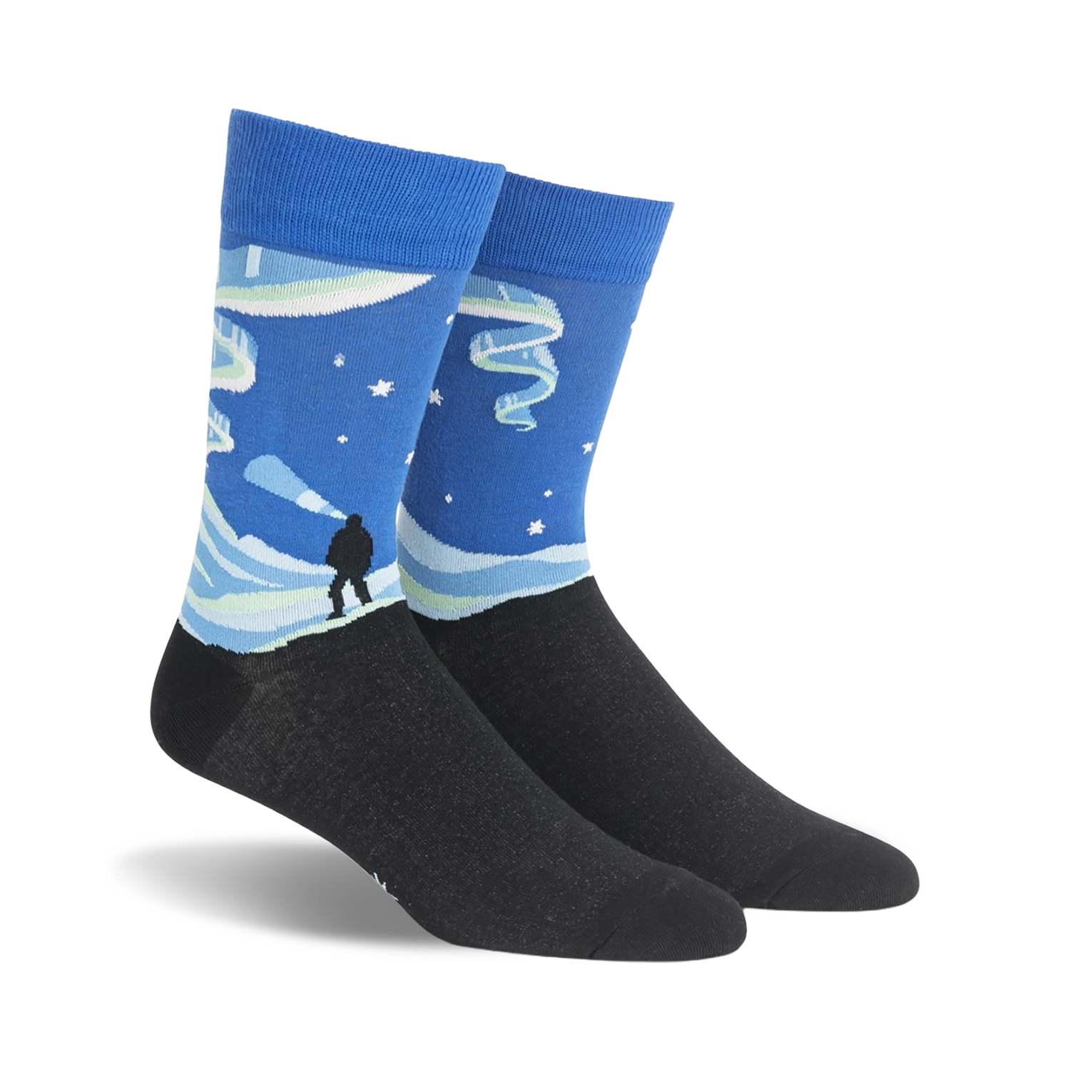 Crew socks showcasing a Northern Lights design. The socks are primarily blue with teal and white accents, depicting a snowy landscape and the aurora borealis.