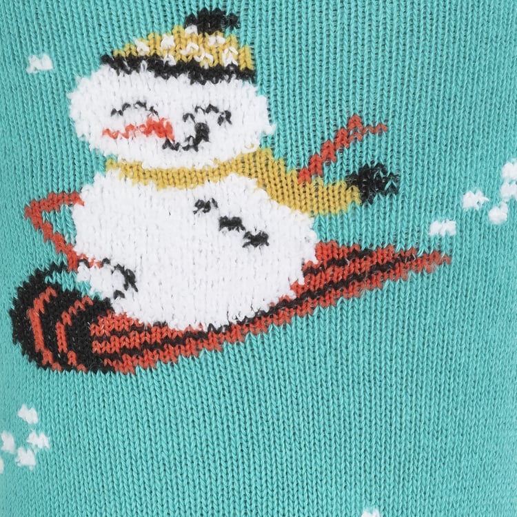 Close-up detail of the 'Having Snow Much Fun' socks, highlighting the intricate snowman design.