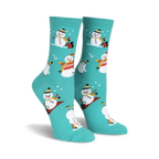 Teal crew socks with a whimsical pattern of snowmen snowboarding, ice skating, and playing in the snow.