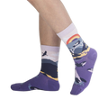 Lifestyle shot showing the Big Sur socks on a person's legs, showcasing the design and fit.