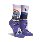 Pair of purple crew socks with a Big Sur-inspired design.  Features whales, a bridge, a rainbow, and coastal mountains.