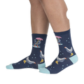 Lifestyle shot of a person's legs wearing the Chicken Little socks, highlighting the fit and pattern.