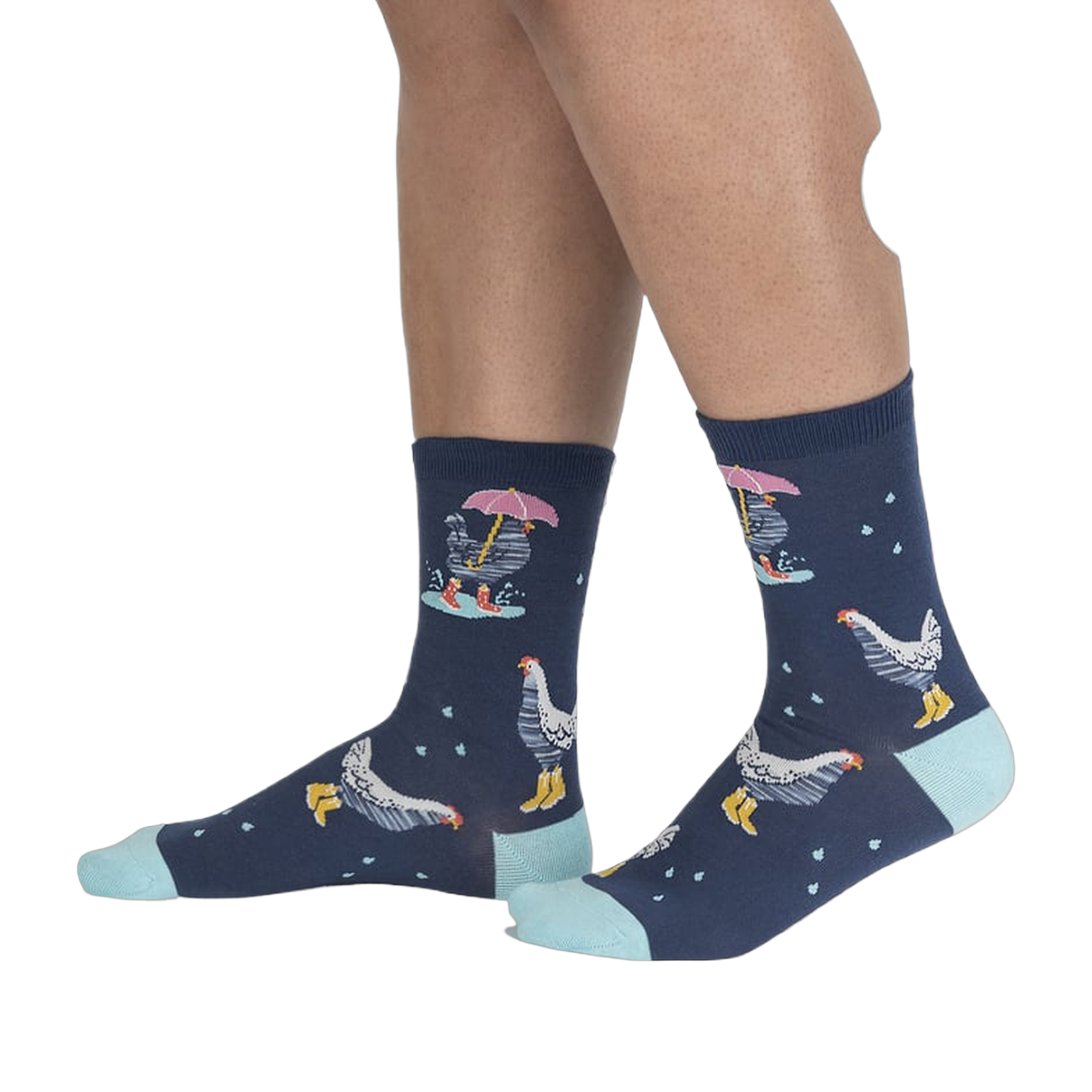 Lifestyle shot of a person's legs wearing the Chicken Little socks, highlighting the fit and pattern.