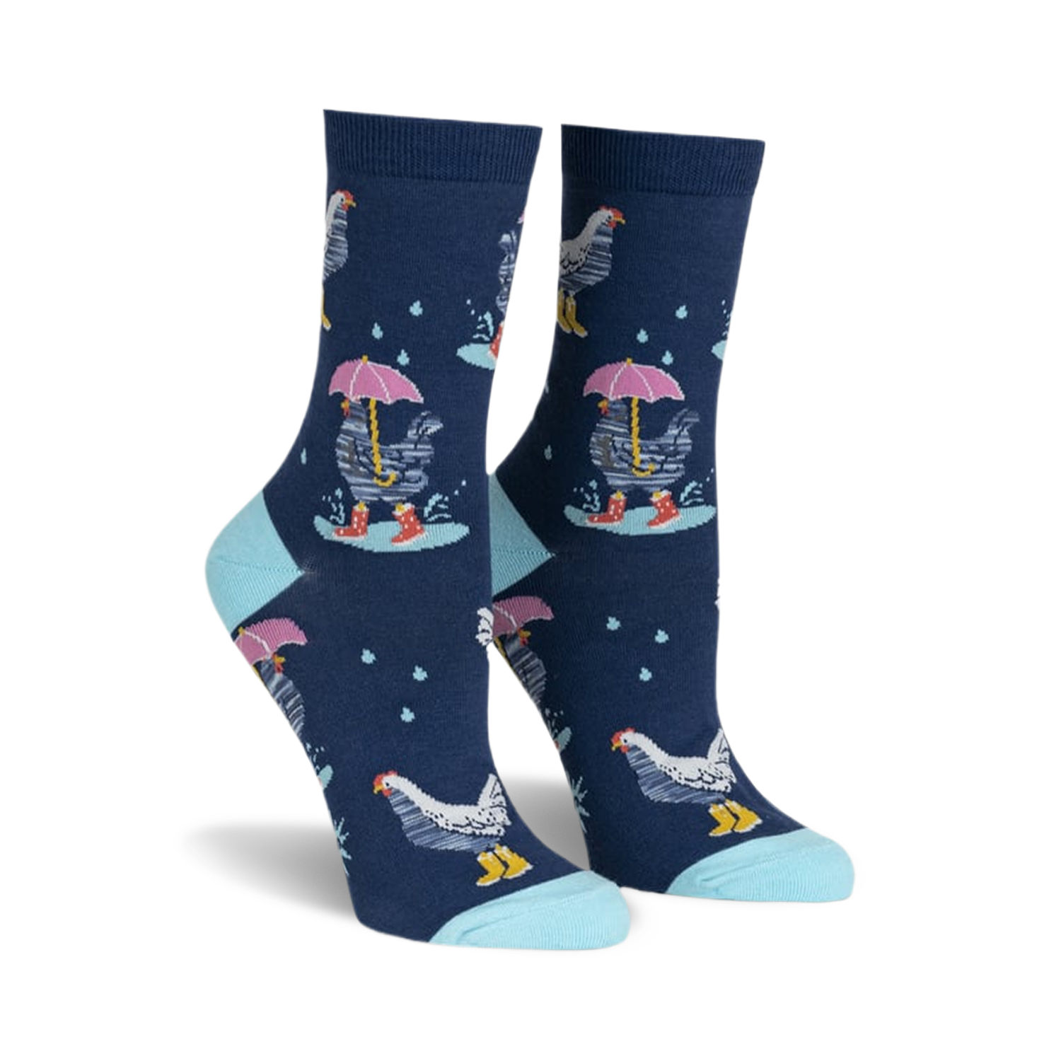 Crew socks in navy blue featuring a repeating pattern of chickens with pink umbrellas and red boots in the rain.