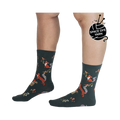 Lifestyle shot showing the socks on a person's legs, highlighting the fit and pattern.