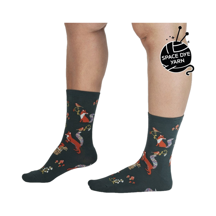 Lifestyle shot showing the socks on a person's legs, highlighting the fit and pattern.