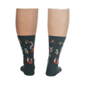 Back view of the socks on a person's legs, showcasing the full design repeat.