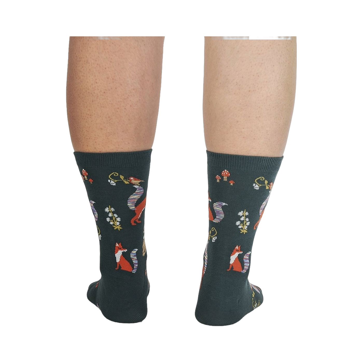 Back view of the socks on a person's legs, showcasing the full design repeat.