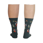 Back view of the socks on a person's legs, showcasing the full design repeat.