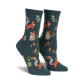 Pair of women's crew socks. Dark teal background with repeating pattern of foxes, squirrels, birds, mushrooms, and flowers. 