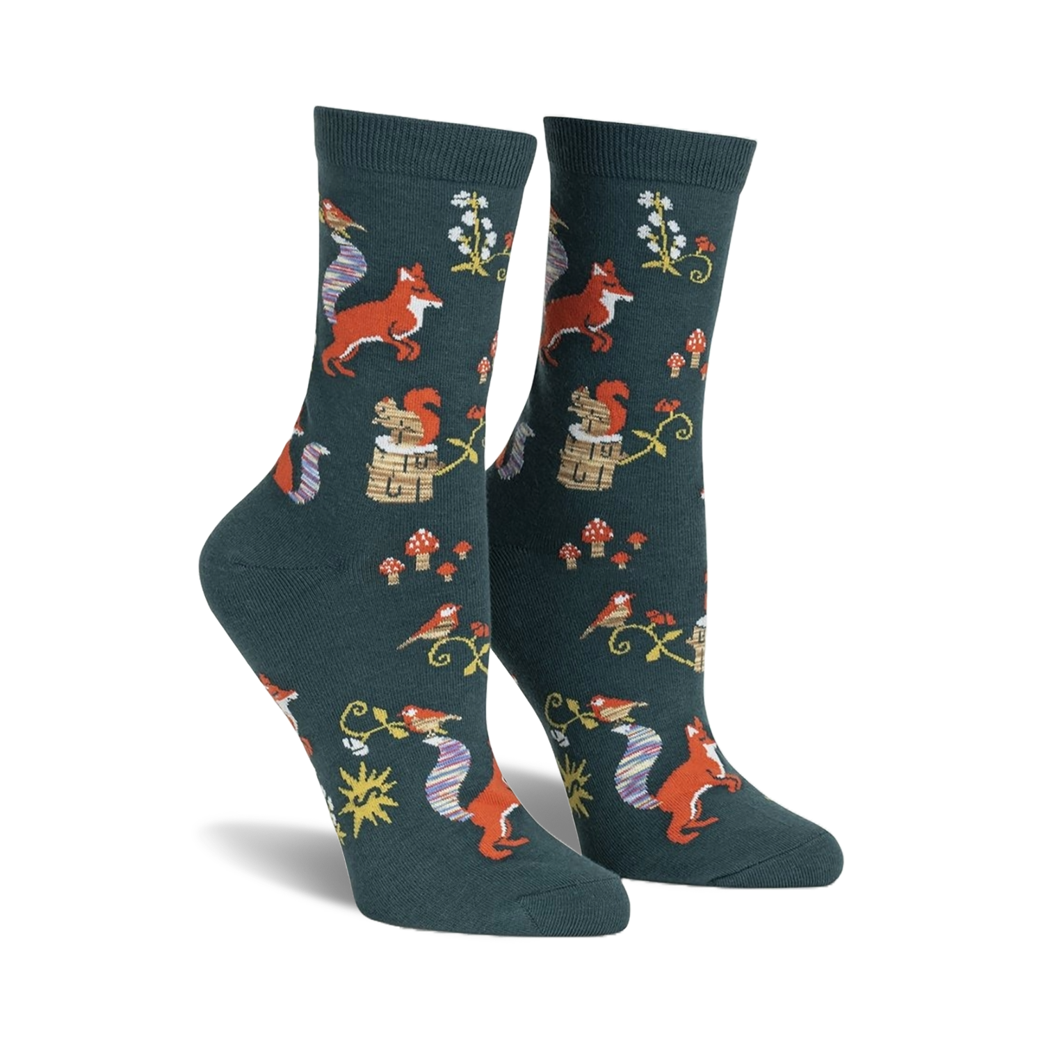 Pair of women's crew socks. Dark teal background with repeating pattern of foxes, squirrels, birds, mushrooms, and flowers. 