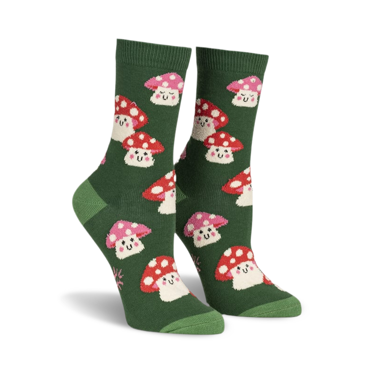Pair of women's crew socks. Green background with repeating pattern of cute, smiling red and pink mushrooms.