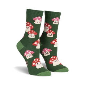 a front view of a pair of green socks with a pattern of red and pink mushrooms.