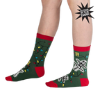 Lifestyle shot of a person modeling the 'Eating Light' socks, showcasing the glow-in-the-dark feature.