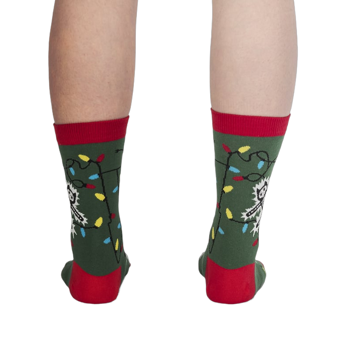 Back view of the 'Eating Light' socks on a model's legs, showing the full design.