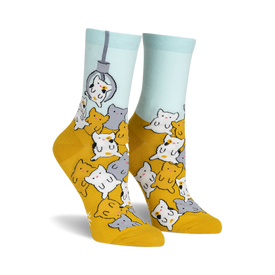 socks with a pattern of cats in claw vending machine grabbers. the cats are multi-colored and the background is yellow. socks that are mostly yellow and have a light blue cuff.
