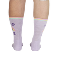 Rear view of the socks on a person's legs, showing the back design.