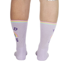 Rear view of the socks on a person's legs, showing the back design.