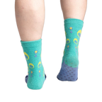 Rear view of the socks highlighting the grippy bottom of the slipper socks.