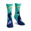 Pair of teal and navy blue fuzzy slipper socks with a whimsical peacock design.  Peacocks are detailed and surrounded by teal and yellow circles.