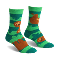 Pair of teal and green fuzzy slipper socks with brown sloths hanging from branches. Crew-length socks with grippers on the bottom.