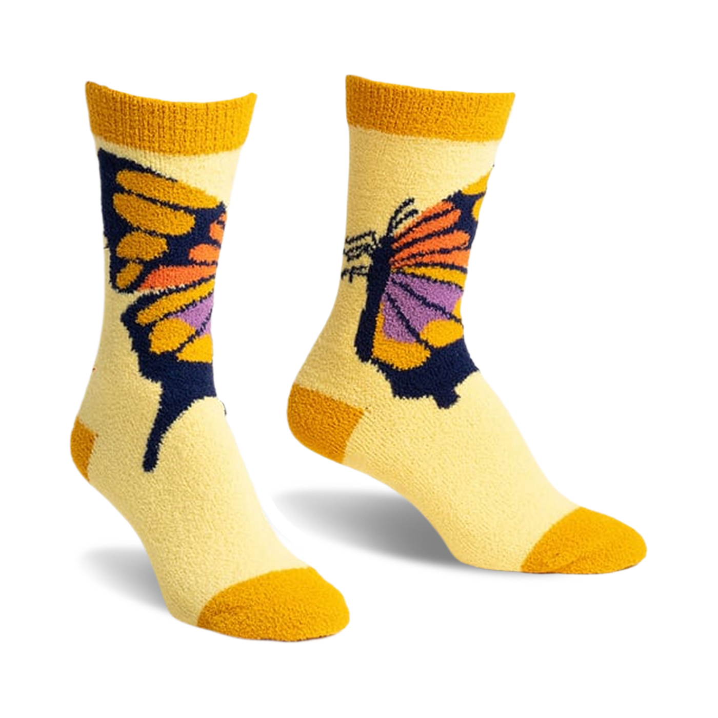 Pair of yellow cozy slipper socks with a colorful butterfly design. The butterfly is orange, purple, and dark blue on a pale yellow background with mustard yellow cuffs.