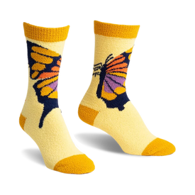 front view of a pair of yellow fuzzy socks with a purple, orange, and yellow butterfly on each sock.