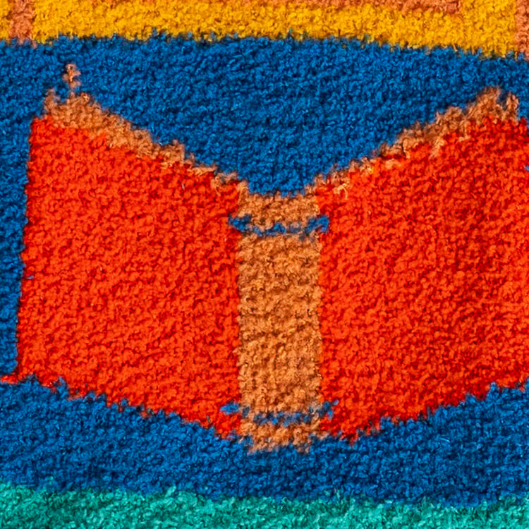 Close-up detail shot of the book design on the fuzzy socks.