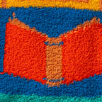 Close-up detail shot of the book design on the fuzzy socks.