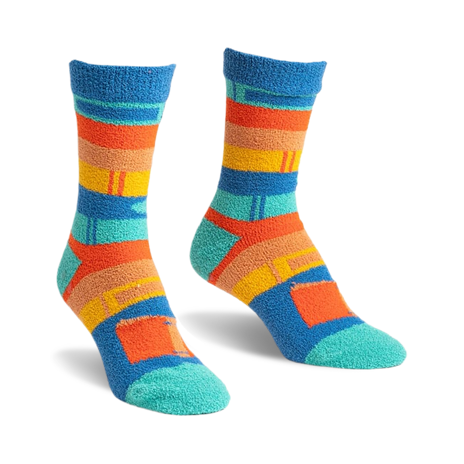 Pair of blue, orange, and teal striped slipper socks with a book design.  Fuzzy, comfy texture.