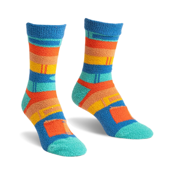 a pair of socks with blue, orange, yellow, and green stripes. the socks are fuzzy.  the photo shows a front view of the socks.