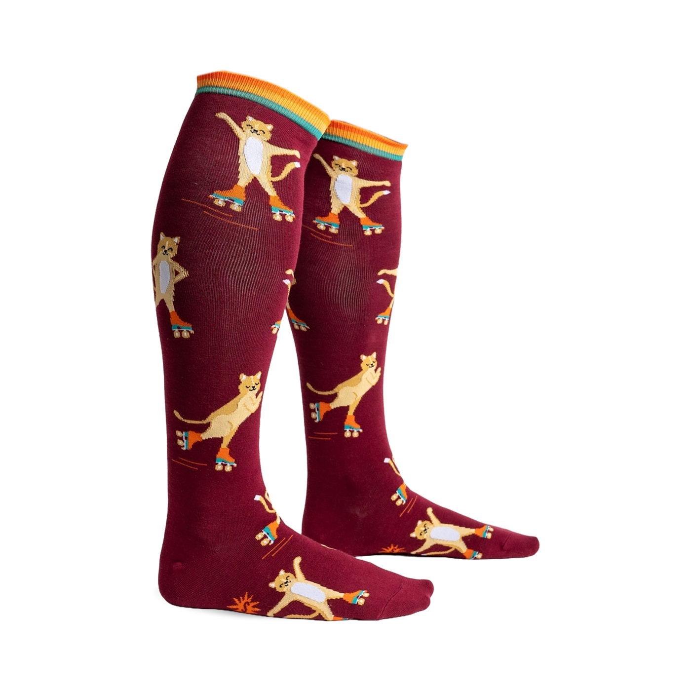 Pair of maroon knee-high socks featuring a pattern of cute cats roller skating. Orange, teal, and yellow stripes at the top.