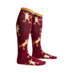 Pair of maroon knee-high socks featuring a pattern of cute cats roller skating. Orange, teal, and yellow stripes at the top.