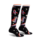Pair of black knee-high socks with rockets, aliens, pizza slices, rainbows, and stars. Colorful, playful design.