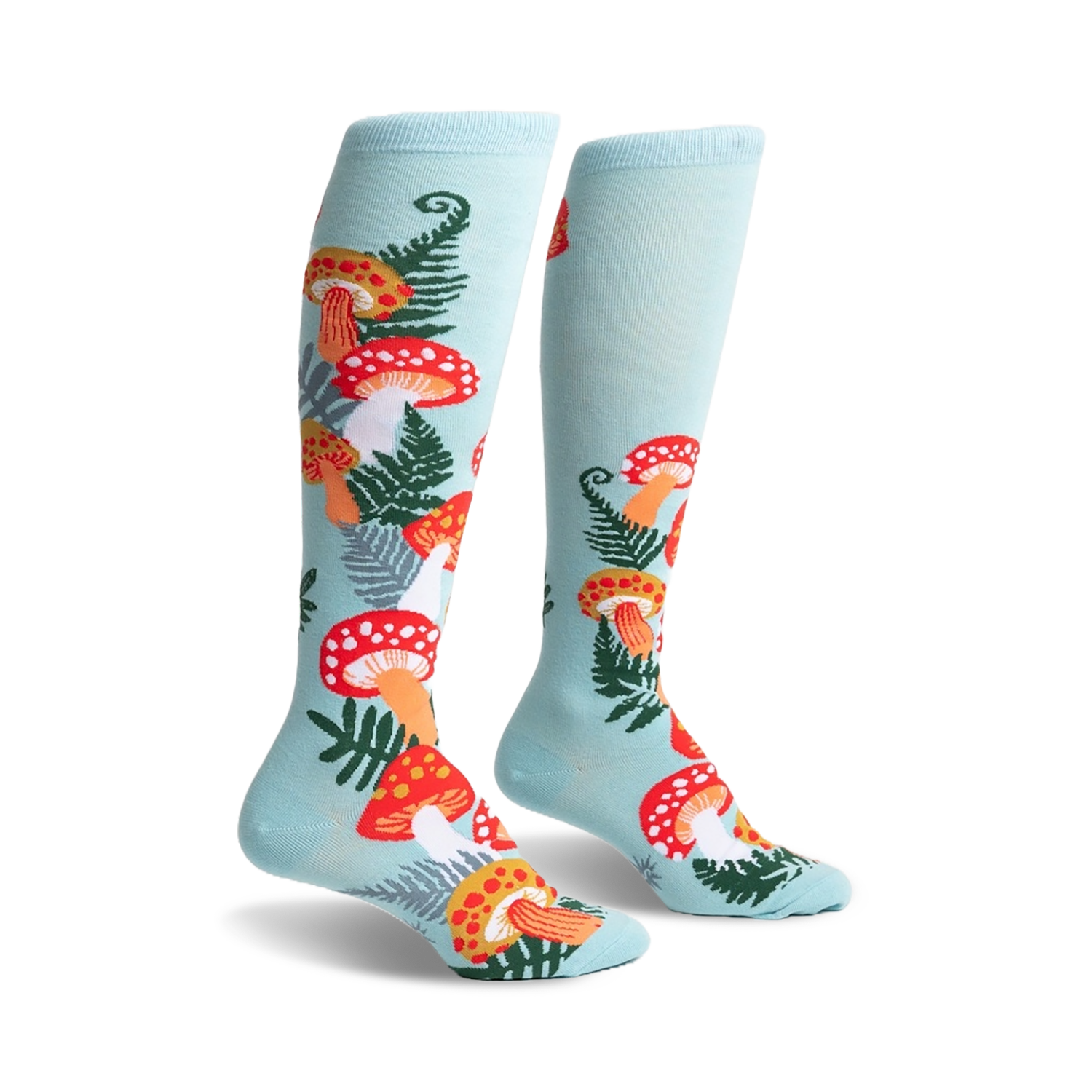 Pair of pastel blue knee-high socks adorned with a whimsical pattern of red and orange mushrooms and green ferns.