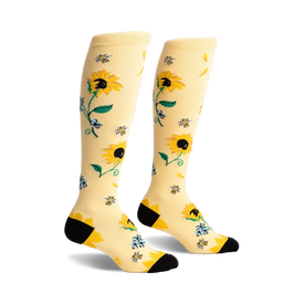 womens vibrant sunflower, bee, and blue flower knee-high socks with black toe and heel.  