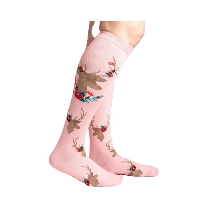 Lifestyle shot showcasing 'Fawn'd of You' knee-high socks on a model's legs, highlighting the sock's fit and pattern.