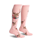 Pair of pink knee-high socks featuring a repeating pattern of gold deer heads accented with red and teal flowers.