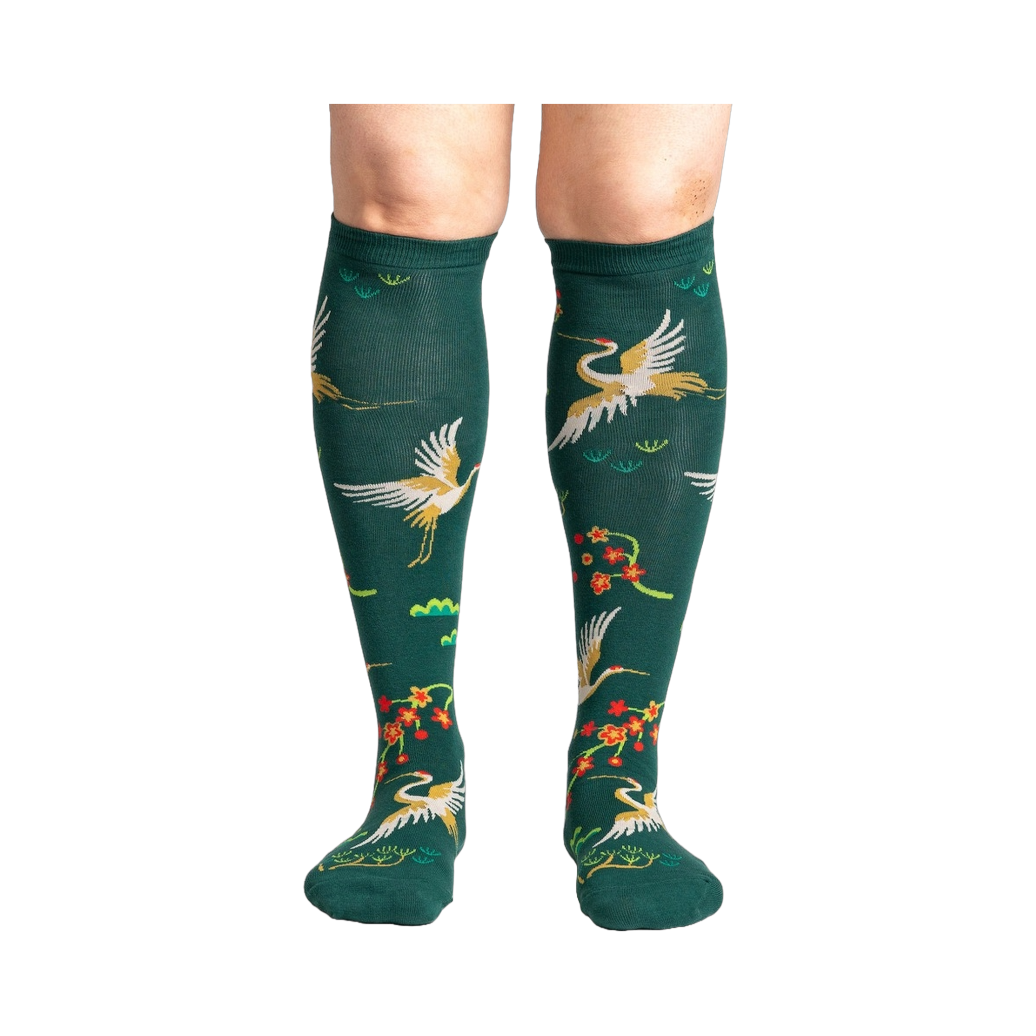 Close-up of a person's legs wearing the Flying Cranes knee-high socks; showcasing the full design on the legs.