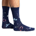 Lifestyle shot showing the socks on a person's legs, showcasing the fit and design.
