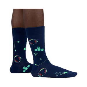 Lifestyle shot of the socks glowing in the dark, highlighting the luminescent design elements.