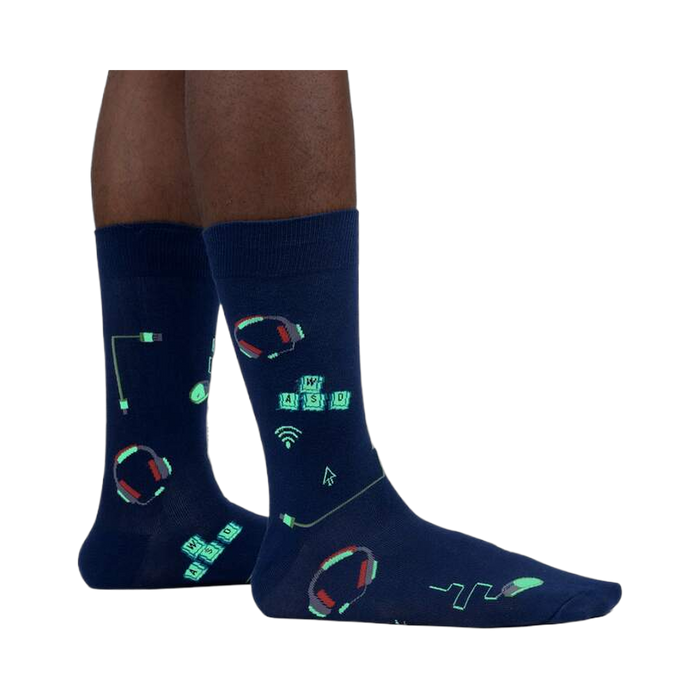 Lifestyle shot of the socks glowing in the dark, highlighting the luminescent design elements.
