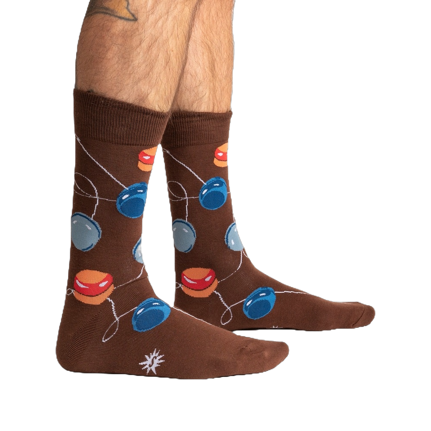 Lifestyle shot of a man's legs wearing the brown yo-yo socks.