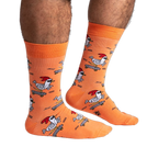 Lifestyle shot of Rad Chicken socks on a person's legs, showing the socks' length and fit.