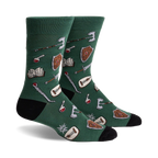 Pair of crew socks in deep green with a fun fantasy design.  Features shields, swords, potions, and books.