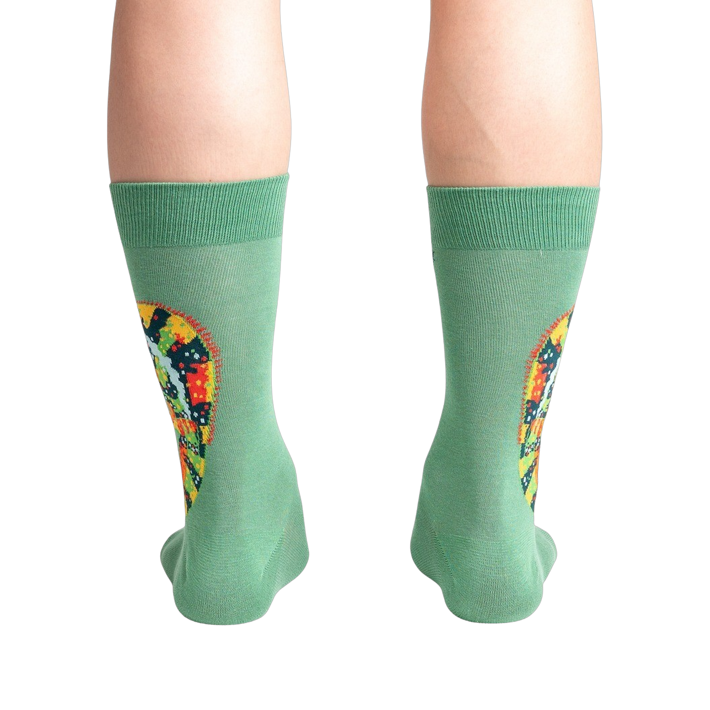 Rear view of a person wearing the socks, highlighting the full chameleon design on the back of the socks.